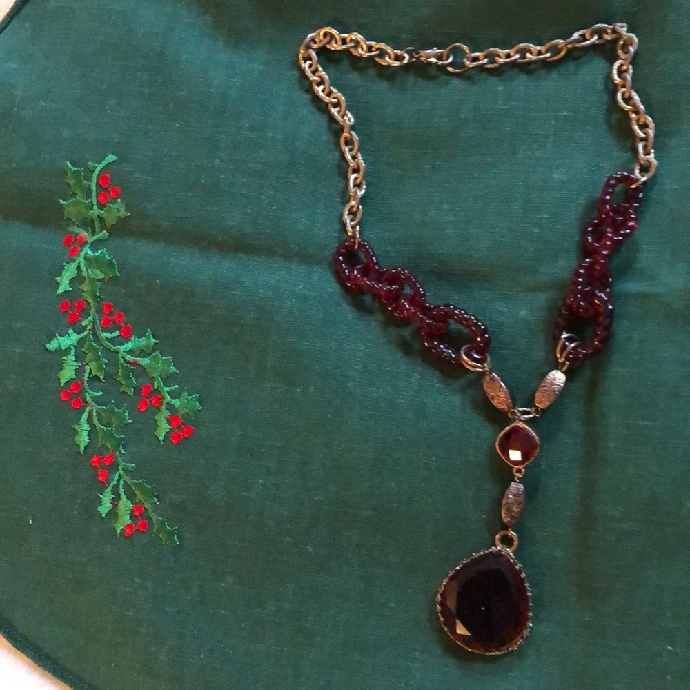 Necklace with gold and burgundy beads and stones